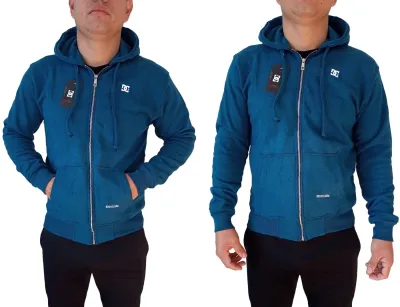 Sudadera DC Shoes lisa para hombre con cierre completo, diseño urbano minimalista.